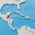 A 3D map showcasing Belize in orange, positioned in Central America. With Mexico to the north, Guatemala to the west and south, and the Caribbean Sea to the east, this renders a clear global position within its continent. Nearby regions of Central America and the Caribbean are labeled.