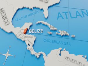 A 3D map showcasing Belize in orange, positioned in Central America. With Mexico to the north, Guatemala to the west and south, and the Caribbean Sea to the east, this renders a clear global position within its continent. Nearby regions of Central America and the Caribbean are labeled.